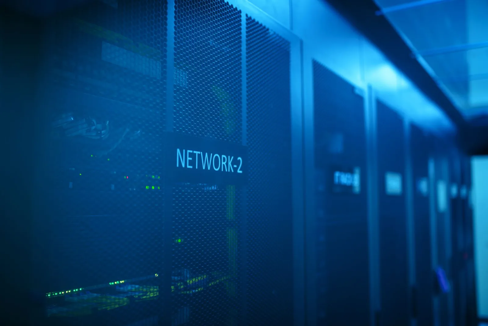 High-speed server racks illustrating the latency gap between millisecond agents and second-scale APIs